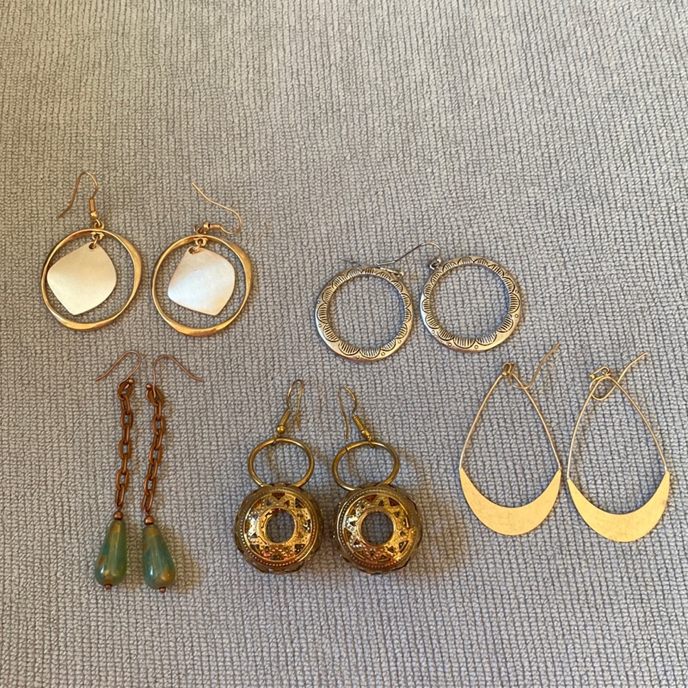 Assortment of earrings.